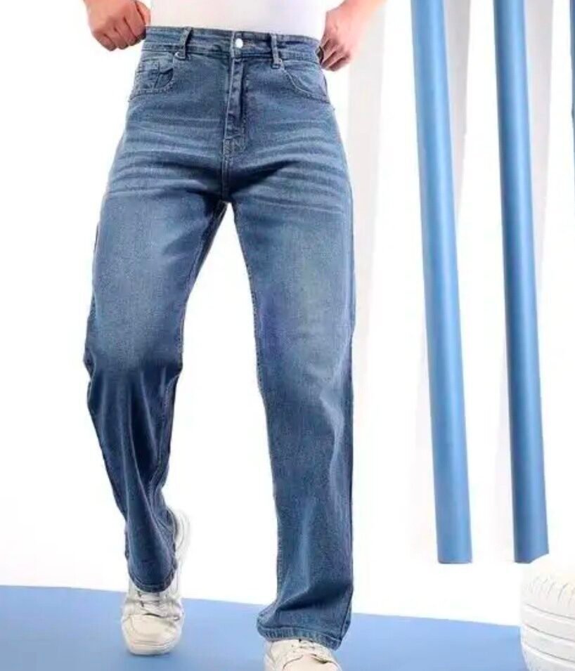 alt="Blue slim fit jeans"